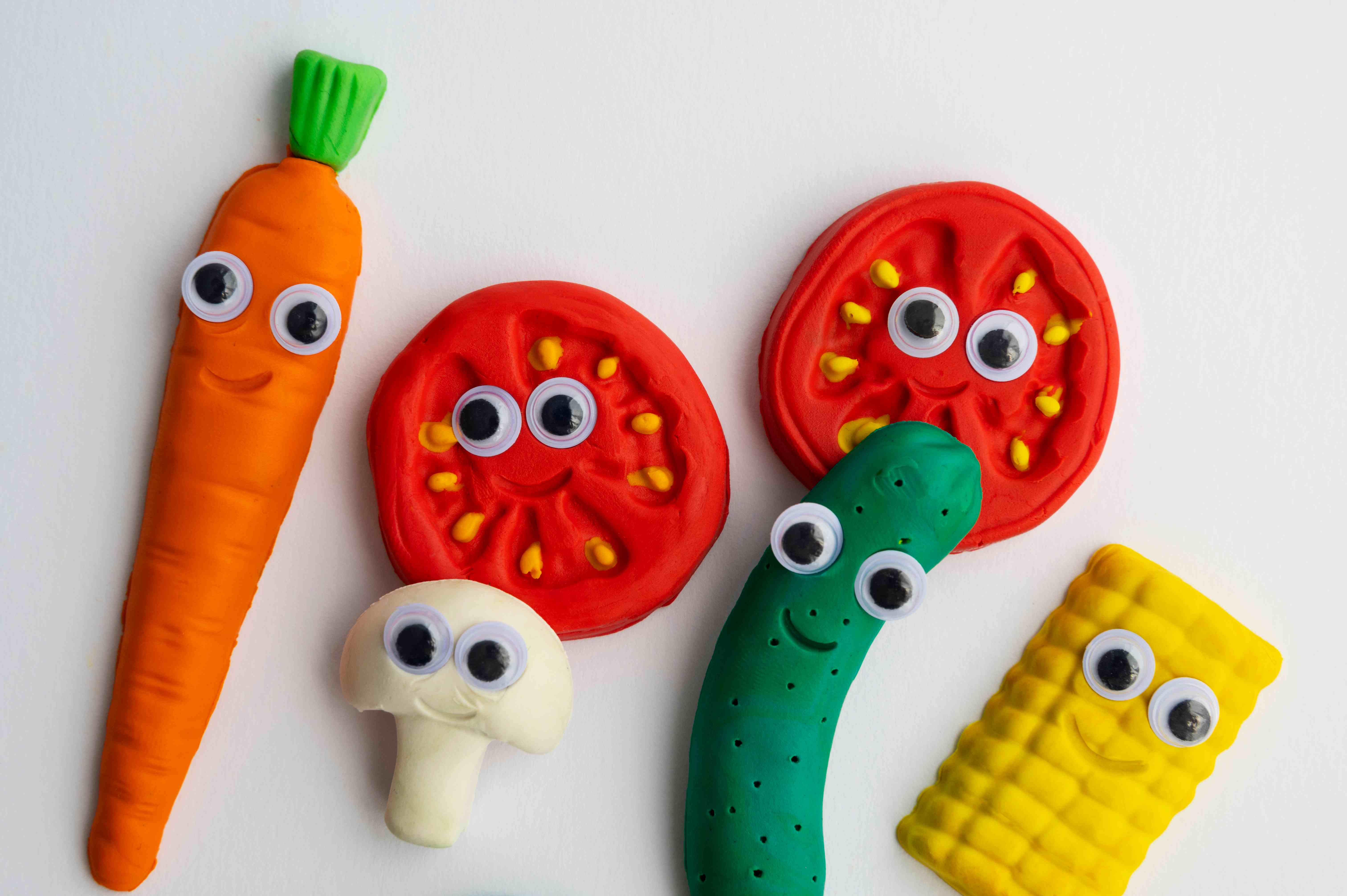 play-dough-background-with-vegetables-flat-lay_11zon.jpg
